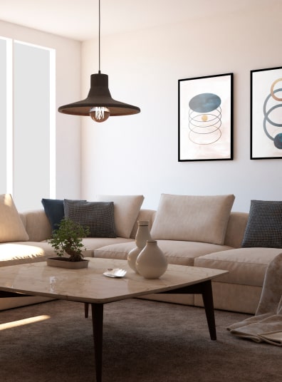 Aménagement intérieur avec cadres photos canapé