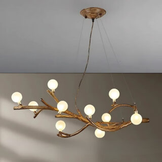 Plafonnier original branche d’arbre et boules de lumière sur fond gris.