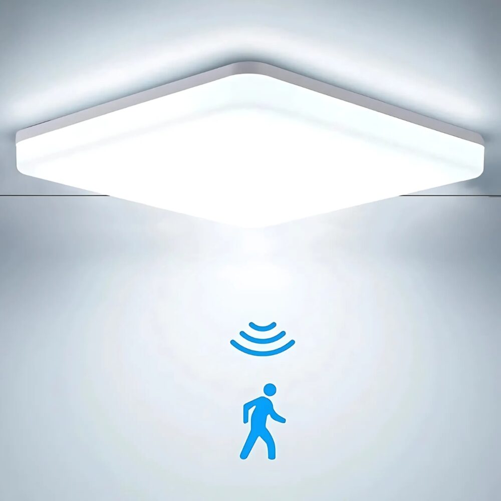 Plafonnier détecteur de mouvement carré avec un éclairage blanc. Un symbole et un bonhomme bleu sous le plafonnier.