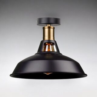 Plafonnier style industriel vintage en noir mat avec une partie dorée sur fond neutre