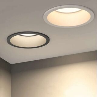 Plafonnier encastrable rond noir et blanc sur fond blanc