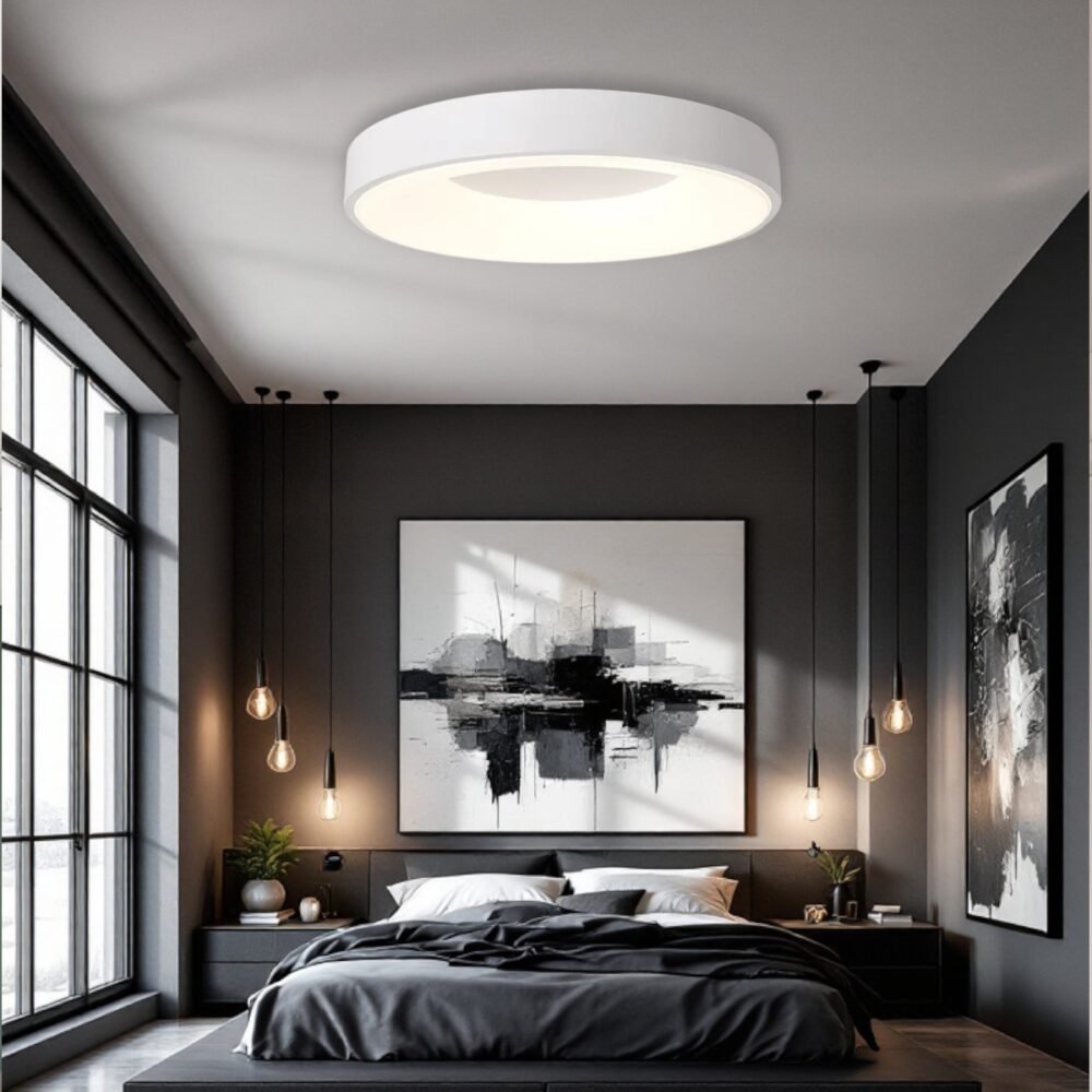Plafonnier Rond blanc en forme de cercle qui illumine une chambre à coucher