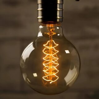 Ampoule plafonnier ronde avec filament incandescent style Edison sur fond gris